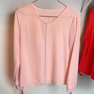Pink blouse with lace detail